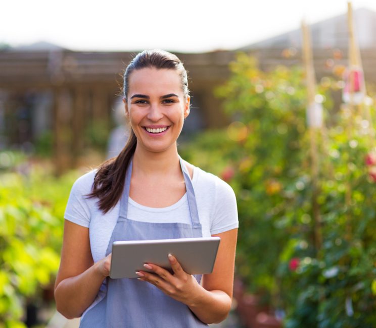 Garden,Center,Worker,Using,Digital,Tablet Garden,Center,Worker,Using,Digital,Tablet